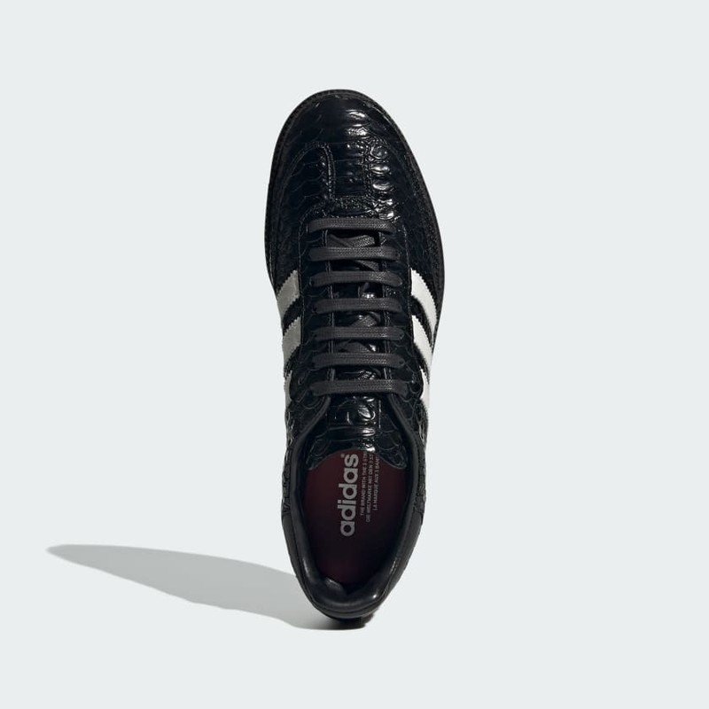 Adidas nmd snakeskin black hot sale